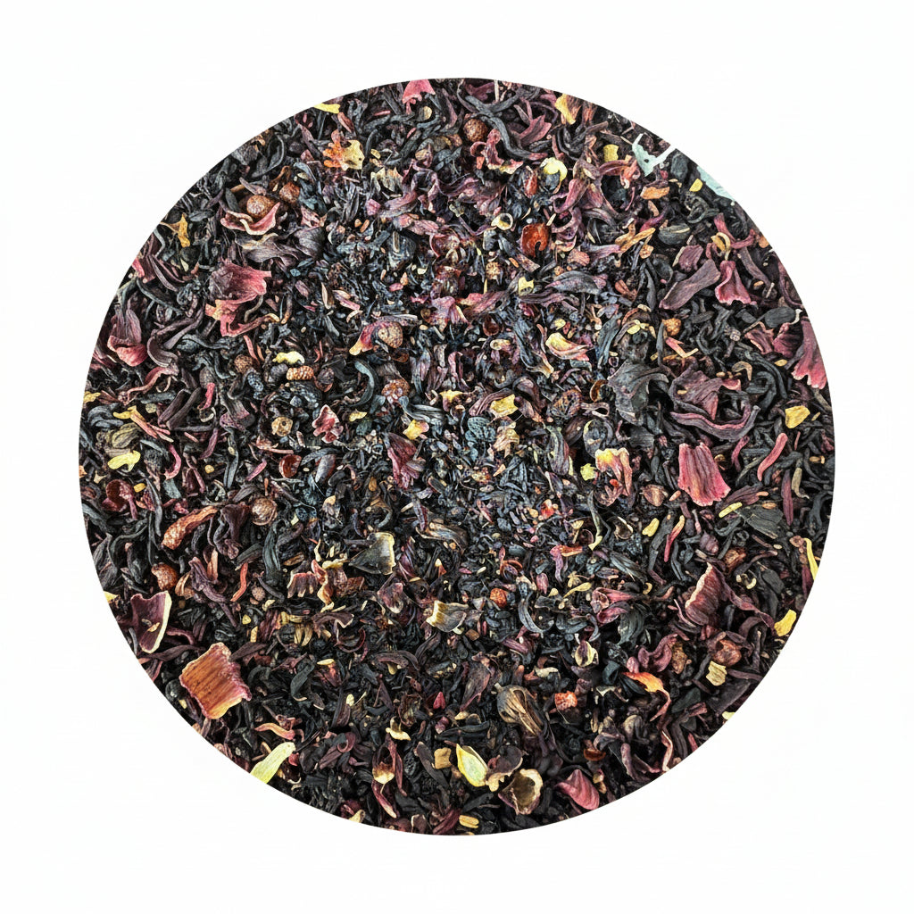 Close-up of dried black tea leaves with some yellow and red elements. sweet berry rooibos tea